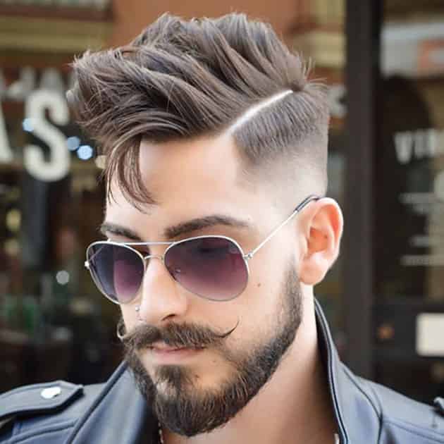 Medium Beard With Curved Mustache and Fade Hair