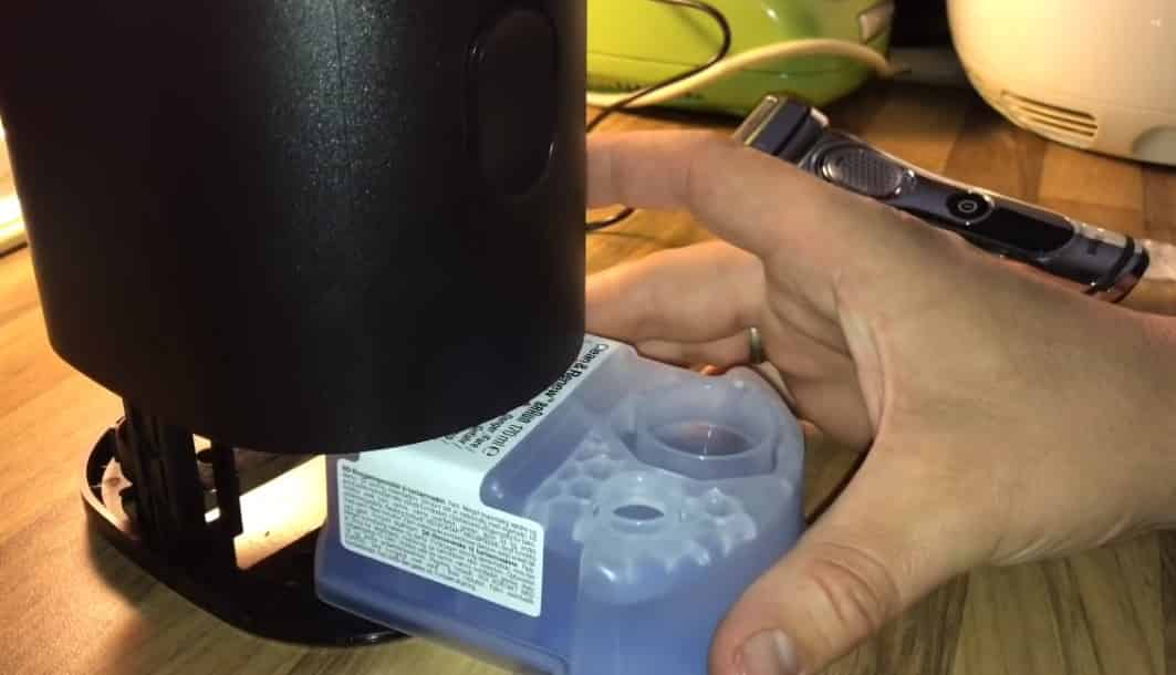 How to insert the cleaning cartridge into cleaning dock